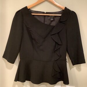 WHBM Black Peplum top. Size 0